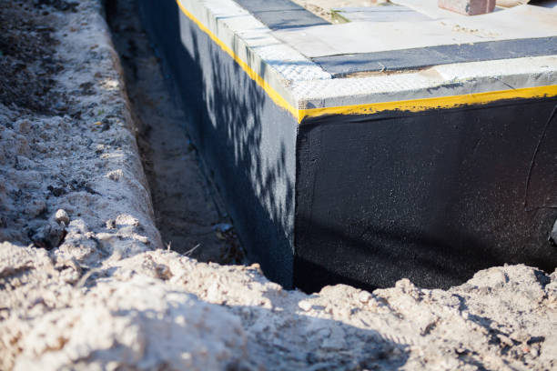Professional Emergency Waterproofing technician working in Morenci, MI